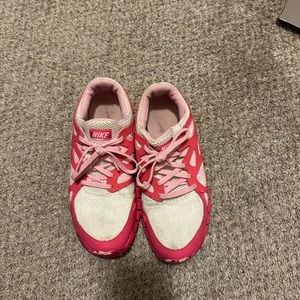 Nike women’s running shoes, pink, size 8.5.
